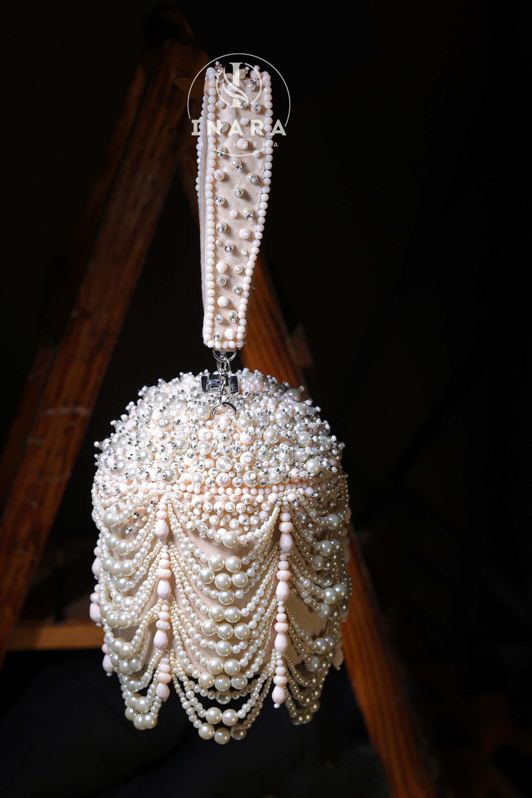 The Miraaz Ivory pastel bucket bag