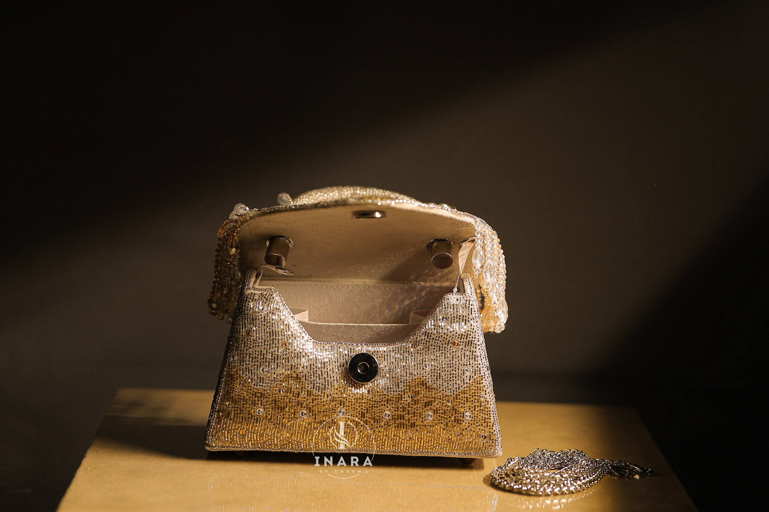 Noura Golden & Silver Embellished Statement Clutch - Image 4